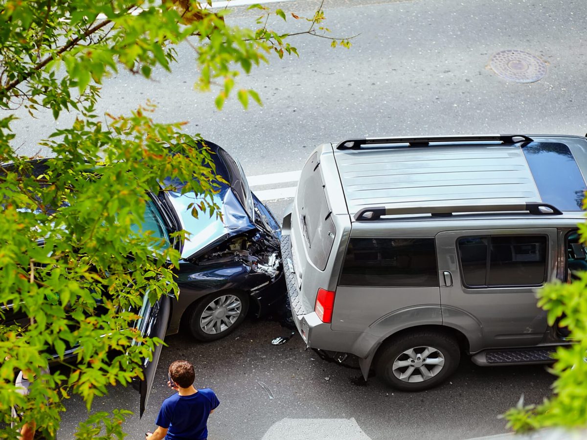 automobile crash accident on street, damaged cars after collision in city